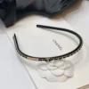 Băng Đô Chanel Headband Màu Đen Vàng